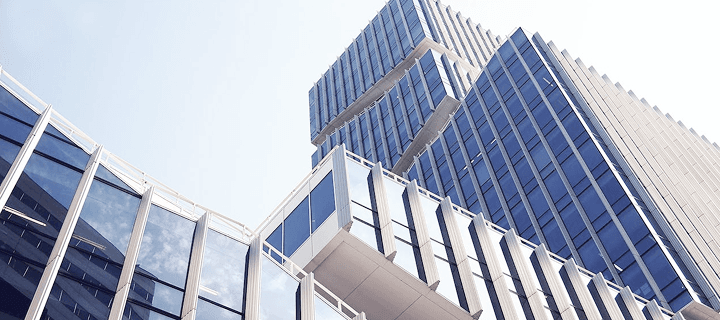 Modern glass buildings representing business and finance